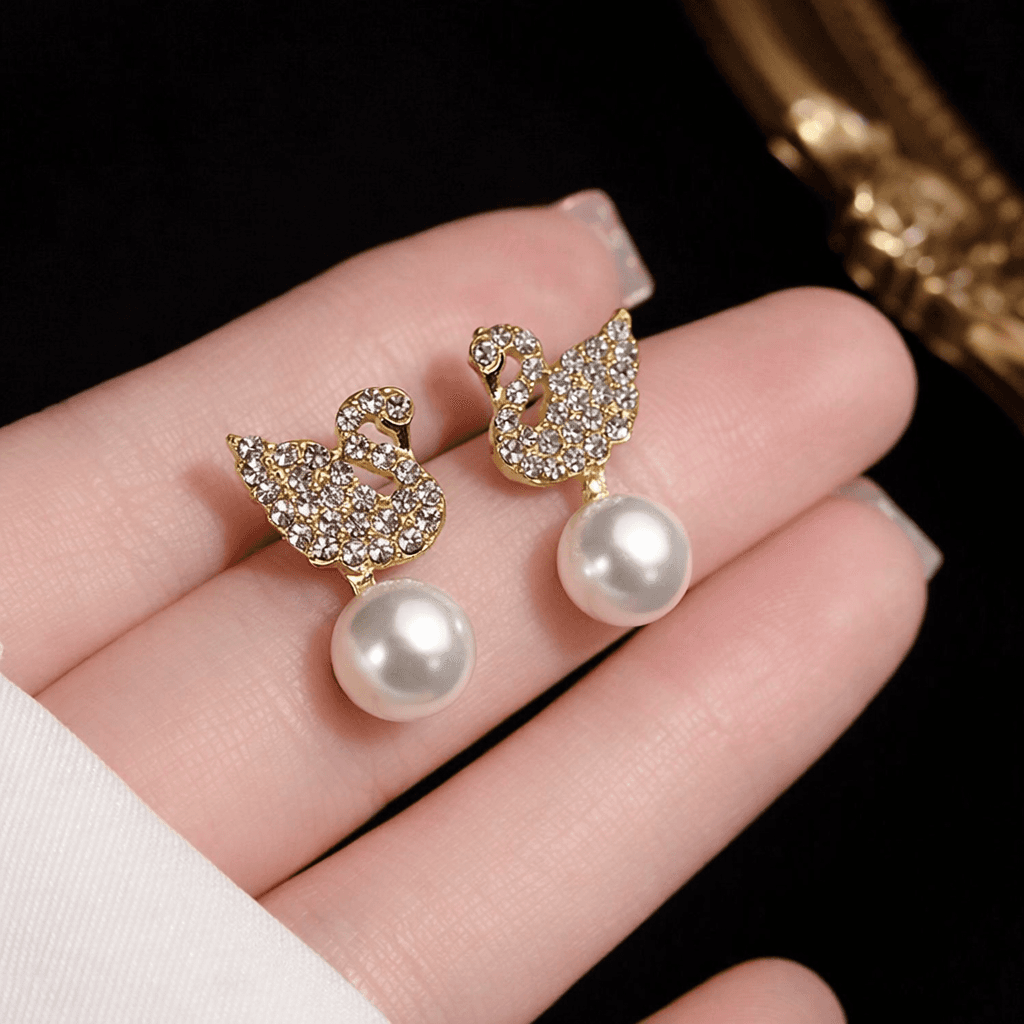 Gold Toned Swan Stud Pearl Earrings