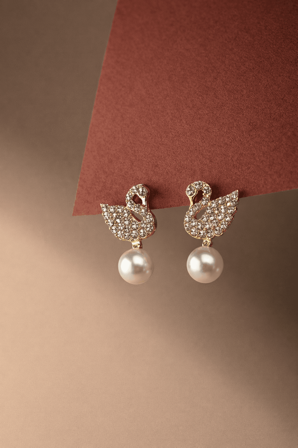 Gold Toned Swan Stud Pearl Earrings