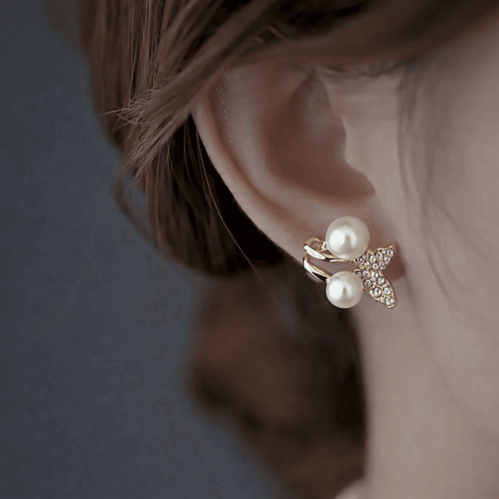 Gold Toned pearl and crystal stud earrings