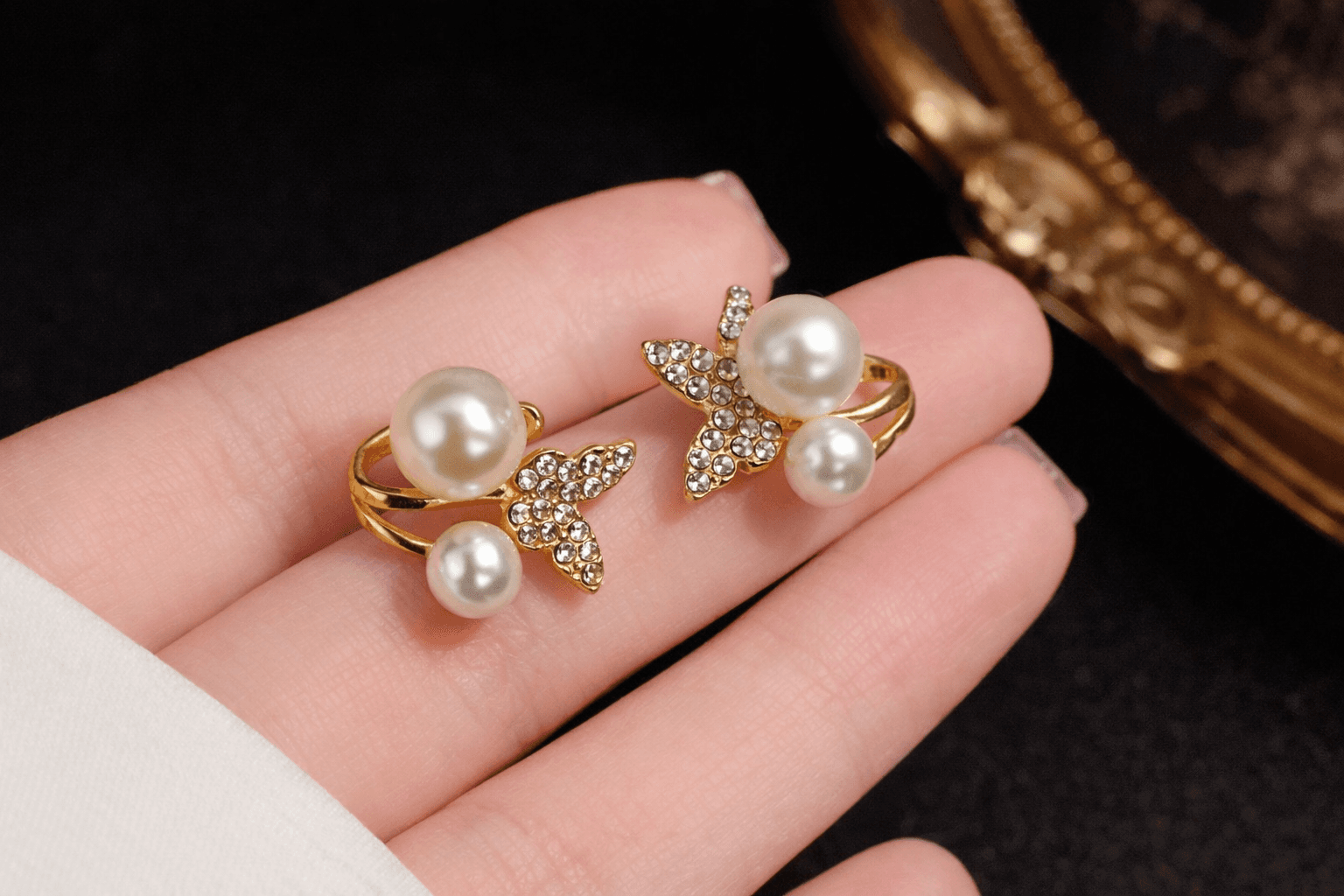 Gold Toned pearl and crystal stud earrings